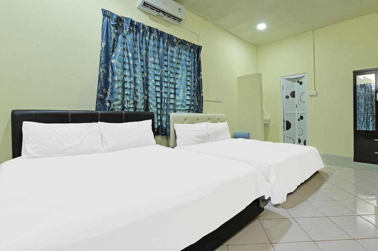 Oyo 90596 Casaria Inn Paka Exterior photo