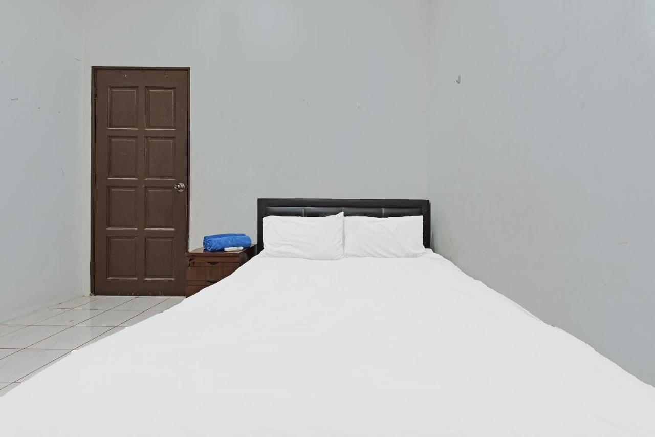Oyo 90596 Casaria Inn Paka Exterior photo